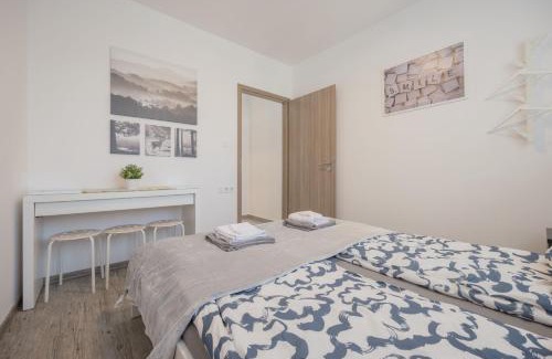 Ferencvaros Apartment | Bright Top Floor Home with Parking