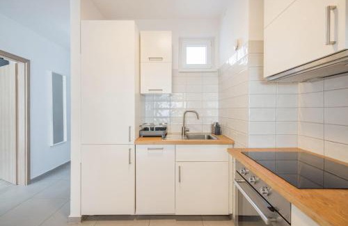 Ferencvaros Apartment | Bright Top Floor Home with Parking