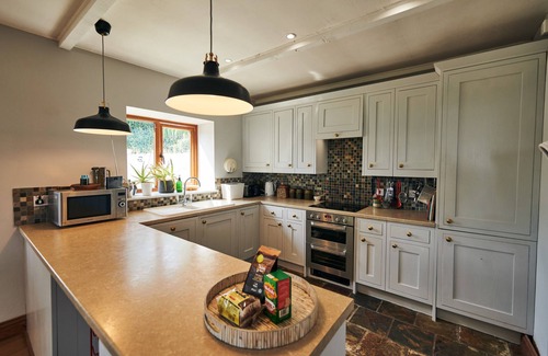 Llanybri Cottage | Brofallen - gorgeous barn conversion with incredible sea views