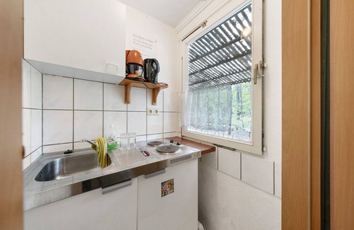 Waldhufen House | Bungalow '36b - Kimbucht' with Private Terrace and Shared Garden