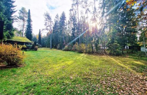 Neubau House | Bungalow direkt am See, mit eigenem Boot