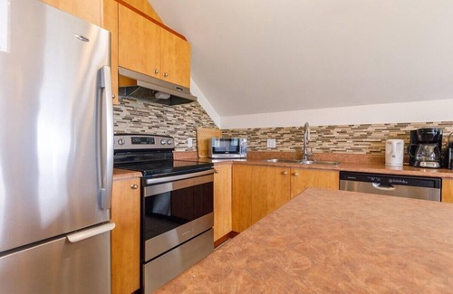 Petite-Riviere-Saint-Francois Condo | Condo 14H: Upper Floor, River View & BBQ