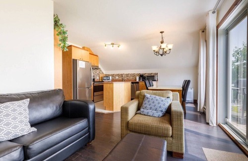 Petite-Riviere-Saint-Francois Condo | Condo 14H: Upper Floor, River View & BBQ