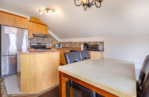 Petite-Riviere-Saint-Francois Condo | Condo 14H: Upper Floor, River View & BBQ