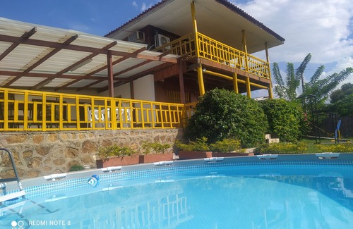 Tubara House | Cabin with ocean and forest views