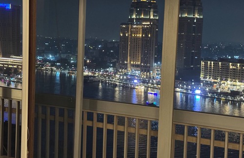Zamalek Apartment | Cairo panoramic Nile window has a 3-bedroom, wide reception high speed WiFi, AC.