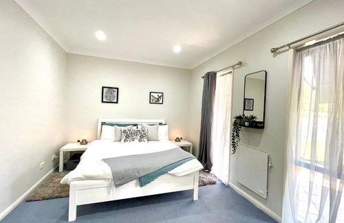 Jimboomba House | Camelot - Homestay - Double Room, private bathroom and private kitchenette on ground floor of our home