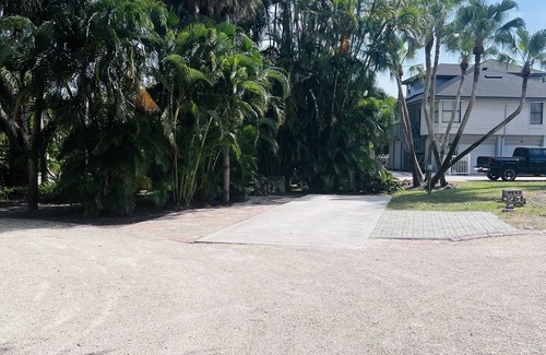 Biggar RV Rental | Canal Kayaking RV pad with 30 or 50 amp hookups for YOUR RV. Close to beach