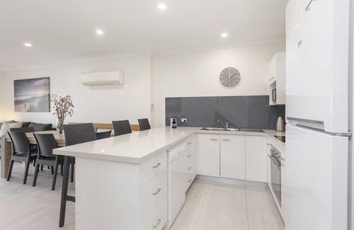 Paynesville Apartment | Captains Cove Waterfront Resort