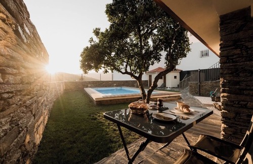 Bomfim House | Casa de Xisto - A cozy house surrounded by the vineyard terraces of the Douro.