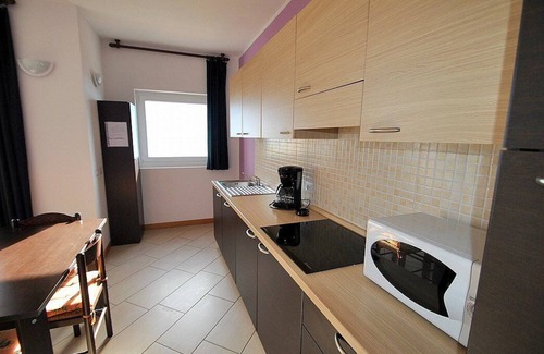 Vercana House | Casa Osmanto E: A cozy and welcoming apartment situated at a short distance from the shores of Lake Como, with Free WI-FI.