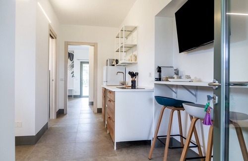 Saline Sadun Apartment | Casale Lorenzo - Apartment 1 with Private Terrace, Shared Garden and Air Conditioning