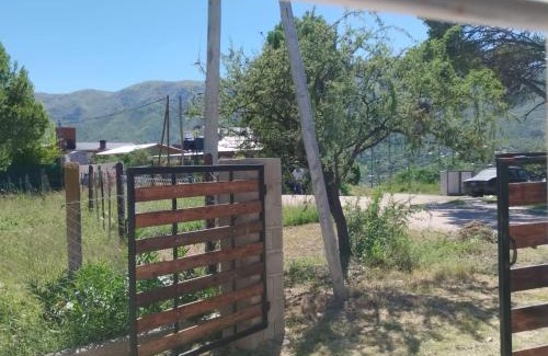 Huerta Grande House | Casas HG-Desayuno sencillo entregado al check in-Pileta climatizada en predio a 2 kilómetros-Acepta mascotas bajo petición-Cochera para 1 auto