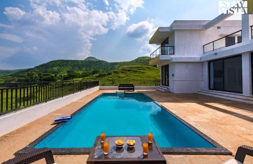 Dindori Villa | Cascading Valleys by StayVista - Villa with Lush mountain & Lake views and swimming pool