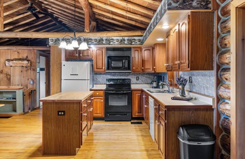 Town of Milo House | Cedar Lane Cabin: Authentic log cabin in wooded setting overlooking rural farmland