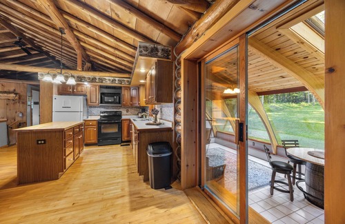 Town of Milo House | Cedar Lane Cabin: Authentic log cabin in wooded setting overlooking rural farmland