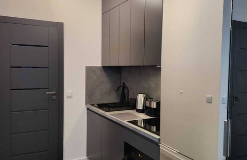 Warsaw Apartment | CentralHouse DomApart Studio with balcony