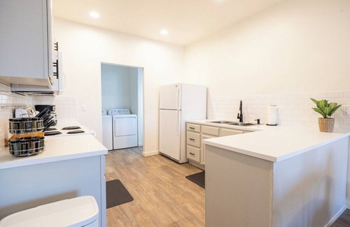 Evergreen House | Centrally-located two bedroom, two bathroom townhome with washer and dryer in a quiet neighborhood