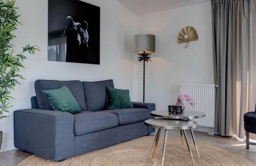 Municipality of Veldhoven Ski Chalet | Chalet by Pond in Eindhoven Holiday Park