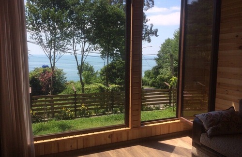 Kvariati Cottage | Chalet Ochos Qokhi - Wooden Cottage with Garden