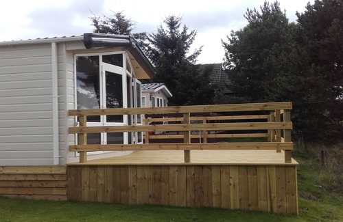 Boat of Garten House | Chalet with large decking, great views, WIFI included. ATTENTION SKIERS - IDEAL