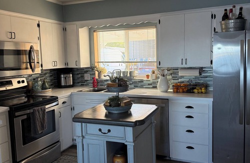 Priest Point House | Charming 2-bedroom water front house with your own beach access.