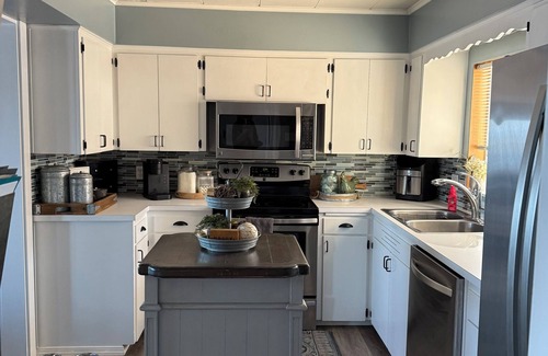 Priest Point House | Charming 2-bedroom water front house with your own beach access.