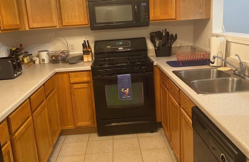 DeKalb House | Charming 3-bedroom townhome in delightful DeKalb with WiFi, AC