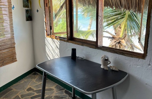 Tiwi Cottage | Charming beach-front cottage in Tiwi for easy-going friends with AC and WiFi
