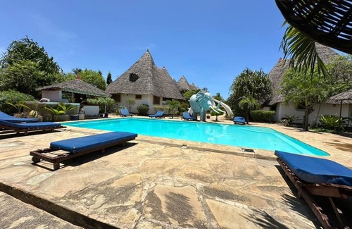 Galu House | Charming building with 2 bedrooms and WiFi, AC in delightful Diani Beach