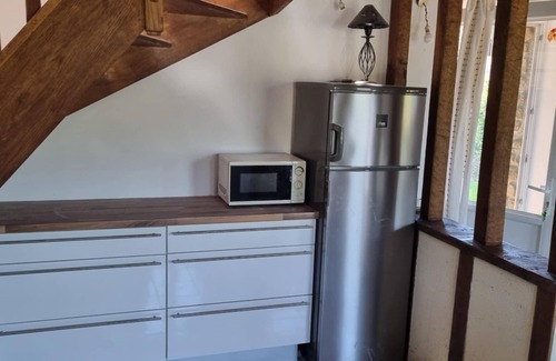 Carelles House | Charming farmhouse with exposed beams, fireplace and grounds not overlooked