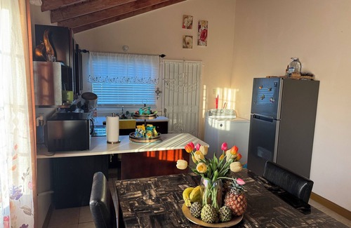 Old Harbour House | Charming gated 2-bedroom house with WiFi, AC, and spacious yard