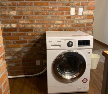 Bucheon Apartment | Charming Home with Rustic Brick Walls Quiet Area, 15 min to Gimpo Airport