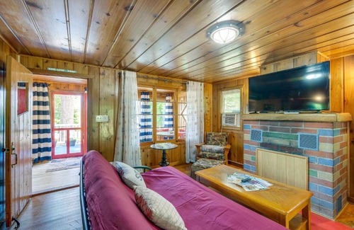 Herron House | Charming Michigan Cottage with Sunroom and Lake Access