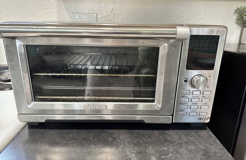 Lowell Cottage | Charming tiny house in lovely Lowell with AC, WiFi, fenced in private space