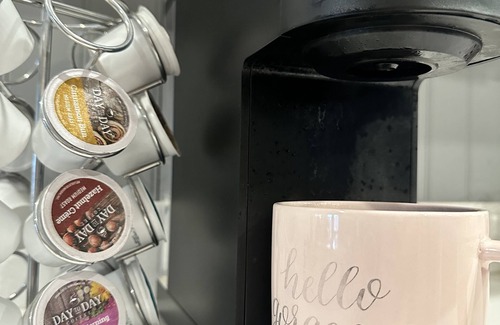 Lowell Cottage | Charming tiny house in lovely Lowell with AC, WiFi, fenced in private space