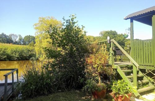 Hadlow Down House | Charming tranquil Shepherds Hut with lakeside balcony 'Roach'