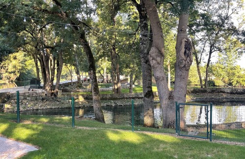 Chenon House | Charming updated and 4-bedroom mill house on the river with fantastic views.