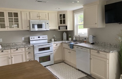 Wolcottville Cottage | Cheerful Cottage Nestled on Beautiful Witmer Lake