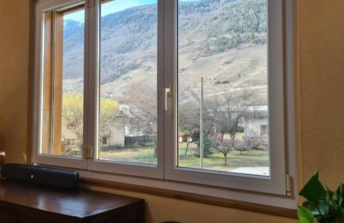 Martigny Apartment | Chez Pewee beautiful duplex with terrace in town. Private park, pets allowed