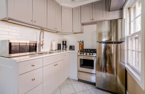 Georgetown House | Chic Georgetown 1BR w/W/D, nr Baseball, Bars & Dining, by Blueground