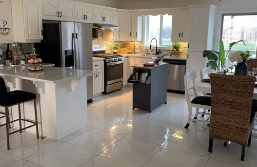 Lakeshore House | Chic, oasis 5BR with in ground Pool Hot Tub, Magical Yard—Perfect for Any Stay