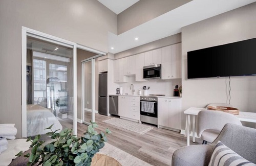 Kitchener Condo | City Views & Private Balcony | Gym, Pool & More!