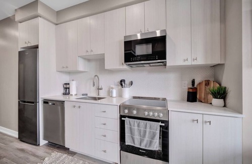 Kitchener Condo | City Views & Private Balcony | Gym, Pool & More!