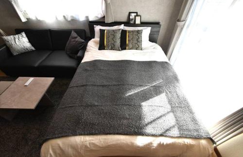 Chuo-ku Apartment | coco de minpaku 今泉