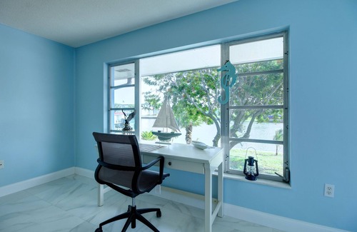 Cocoa Isles Villa | Cocoa Beach canal front heated pool villa