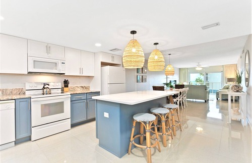 Port Canaveral Condo | Cocoa Beach Towers by Happy Palm Stays