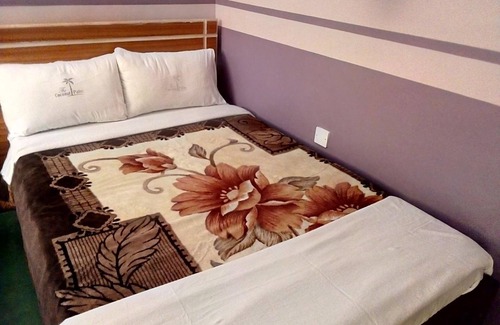 Muiga Hotel | Coconut Palm Hotel