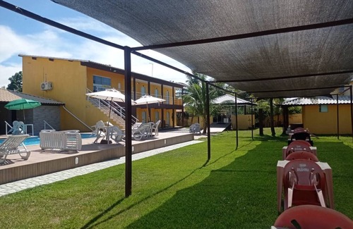 Barra Nova Villa | Comfortable suite with queen-size bed, air conditioning, minibar and smart TV