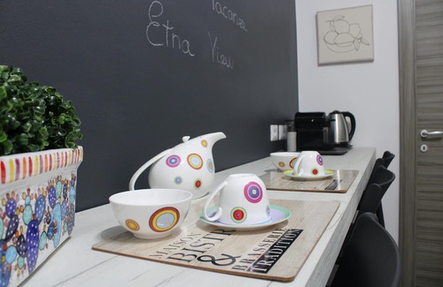 Coste Apartment | Comfortable and quiet apartment in the city center with a view of Etna.